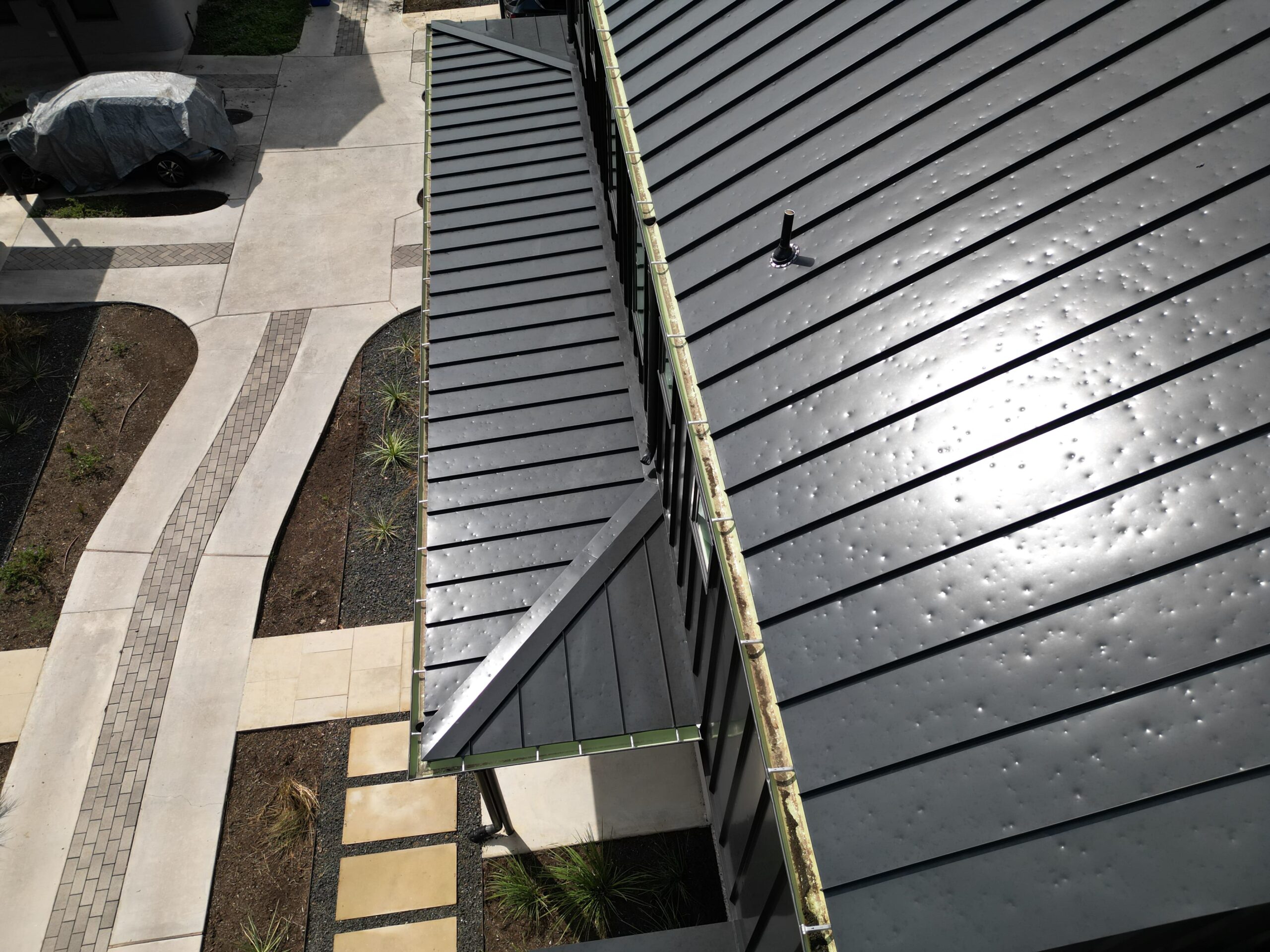 hail damage metal roof repair